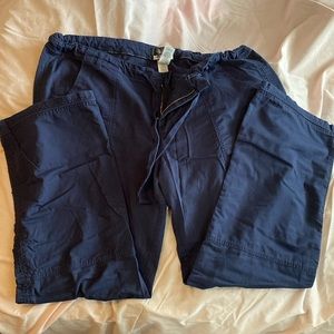 Mens Koi scrub pants. Missing button